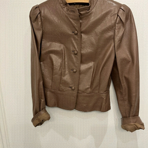 Unique Vintage leather jacket puff sleeve peplum detail back. Le soleil